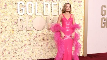 Margot Robbie Pays Dazzling Tribute to Giorgio Armani With Boldly Revealing at London Premiere