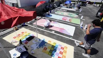 Parking Spots Used as Colorful Protest Against Florida Crackdown on Rainbow Crosswalks