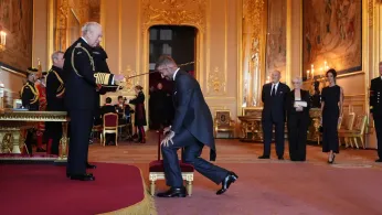 Bend a Knee Like Beckham: Soccer Star Is Knighted by King Charles III